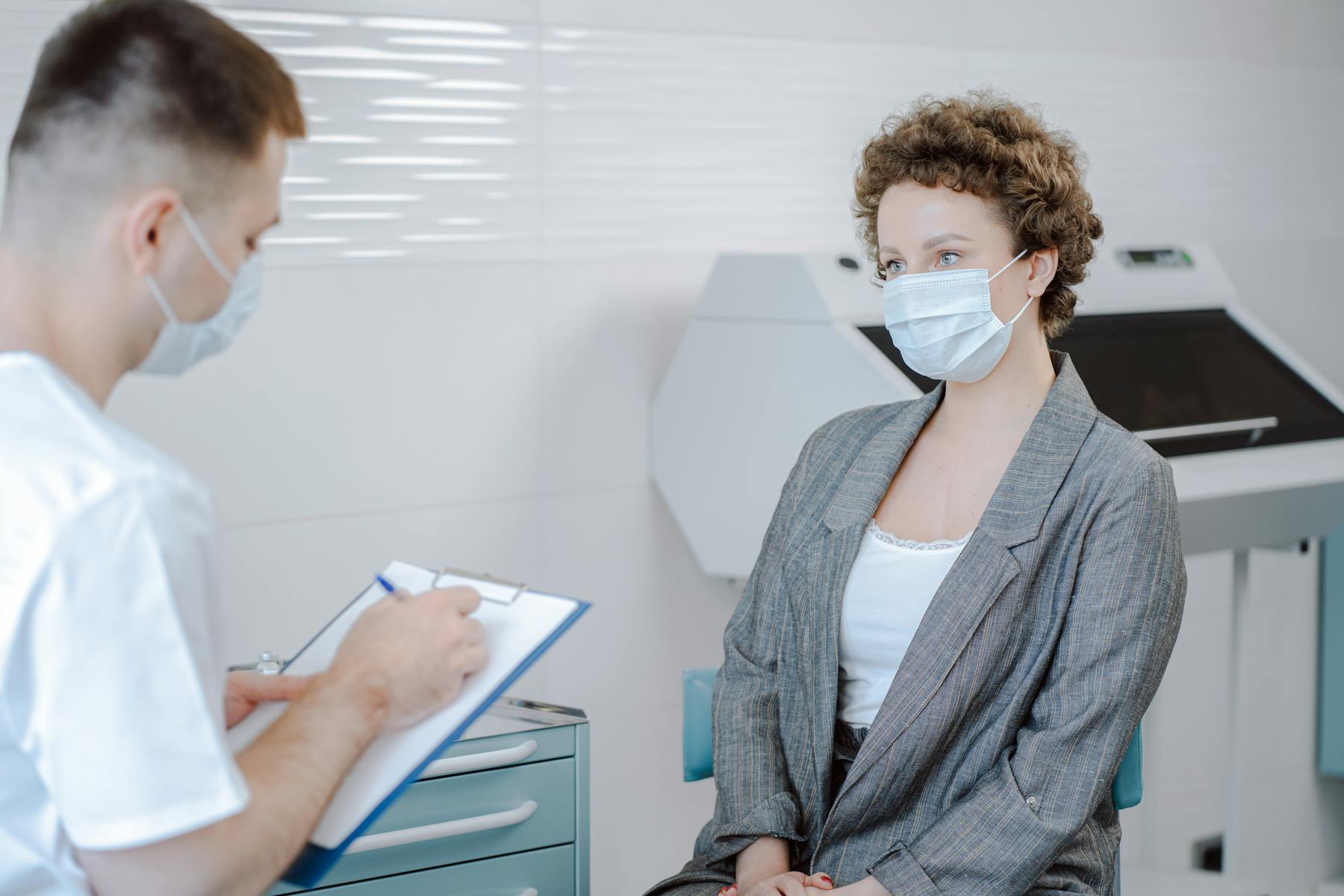 Clinic consultation desk with a calm patient care tone.